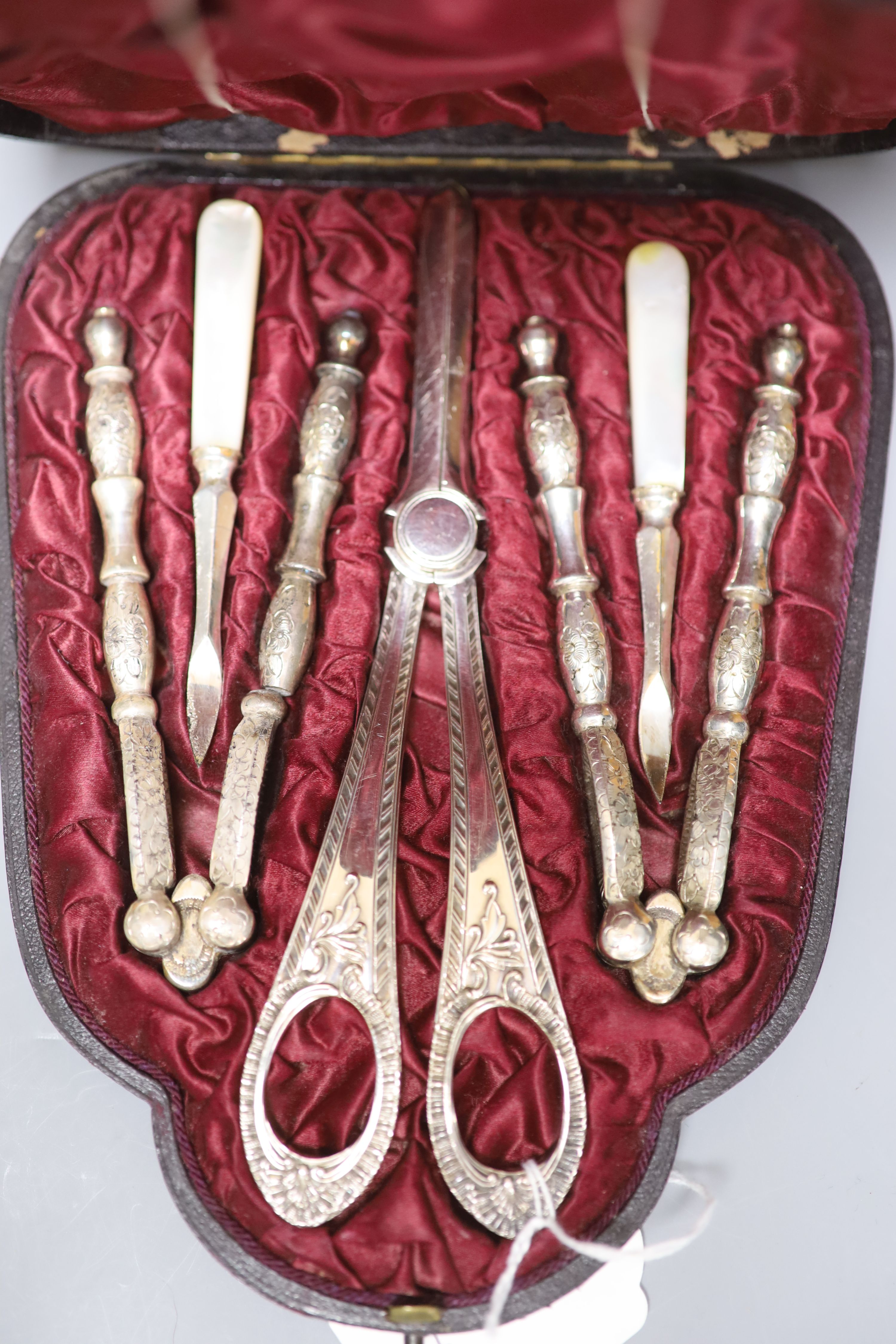 Four cased plated sets and a walnut box